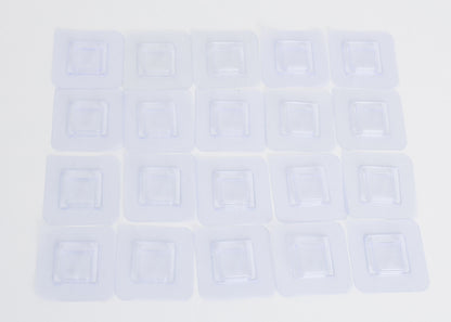 Branch holder -clear adhesive pads that sticks to the white PVC sides