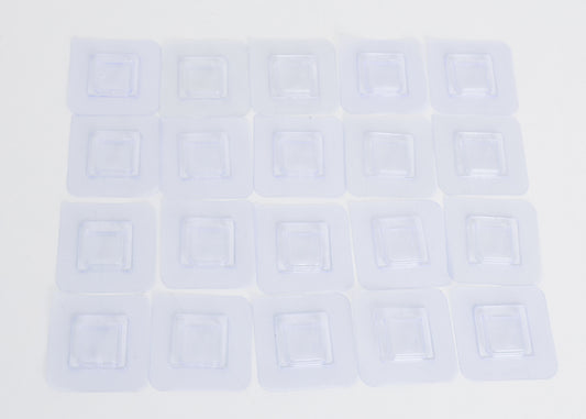 Branch holder -clear adhesive pads that sticks to the white PVC sides